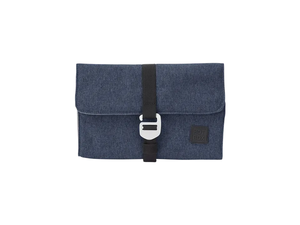 Compact navy blue folio fabric pouch with a black strap and silver buckle.