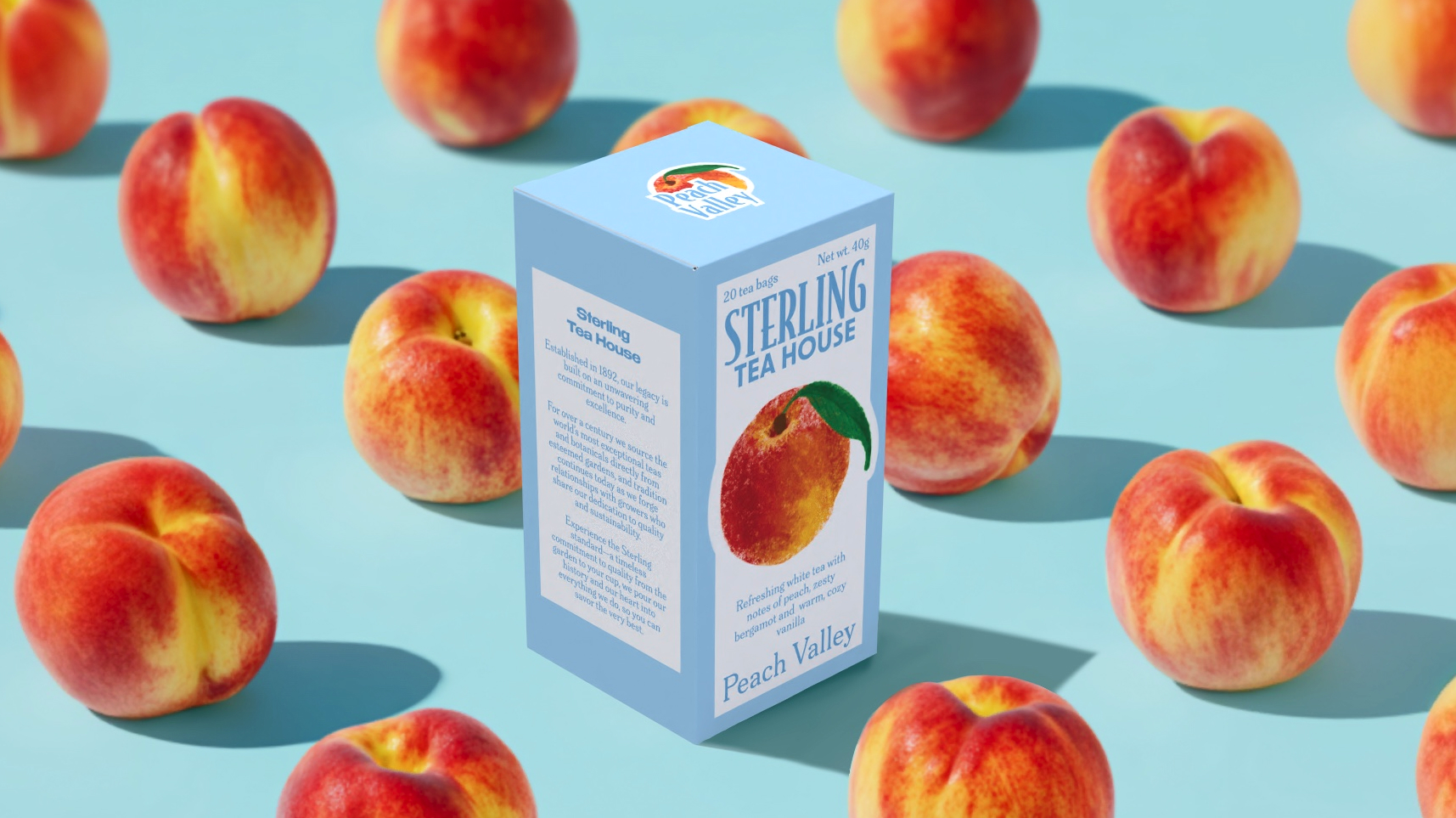 A tea box on a blue background surrounded by juicy peaches
