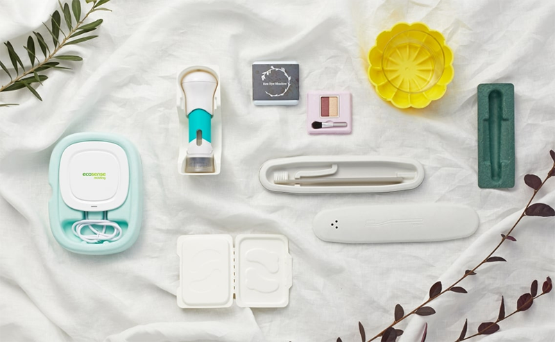 Assorted eco-friendly packaging designs made from sustainable materials, including molded fiber cases, cosmetic containers, and electronic packaging prototypes by Ecosense.