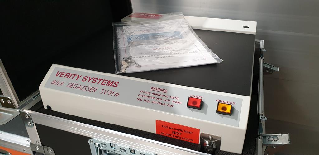 Secure Transportation shows the client the machine they will use, how it operates, and the paperwork before HDD destruction begins.