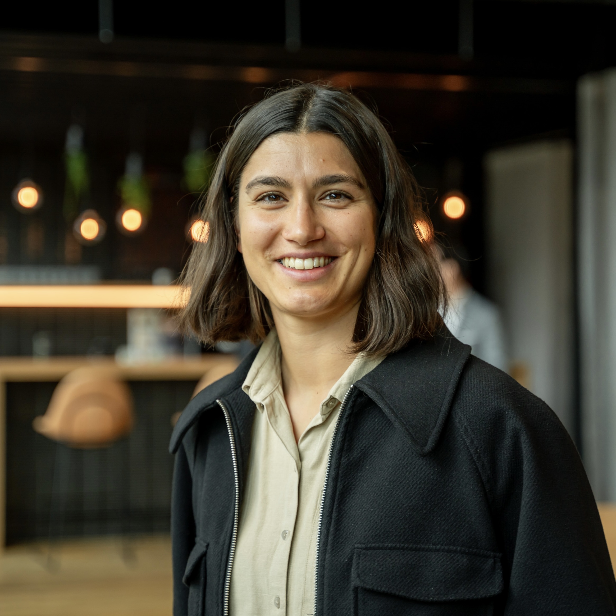 customer giving a testimonial for an ai biotech company [headshot]