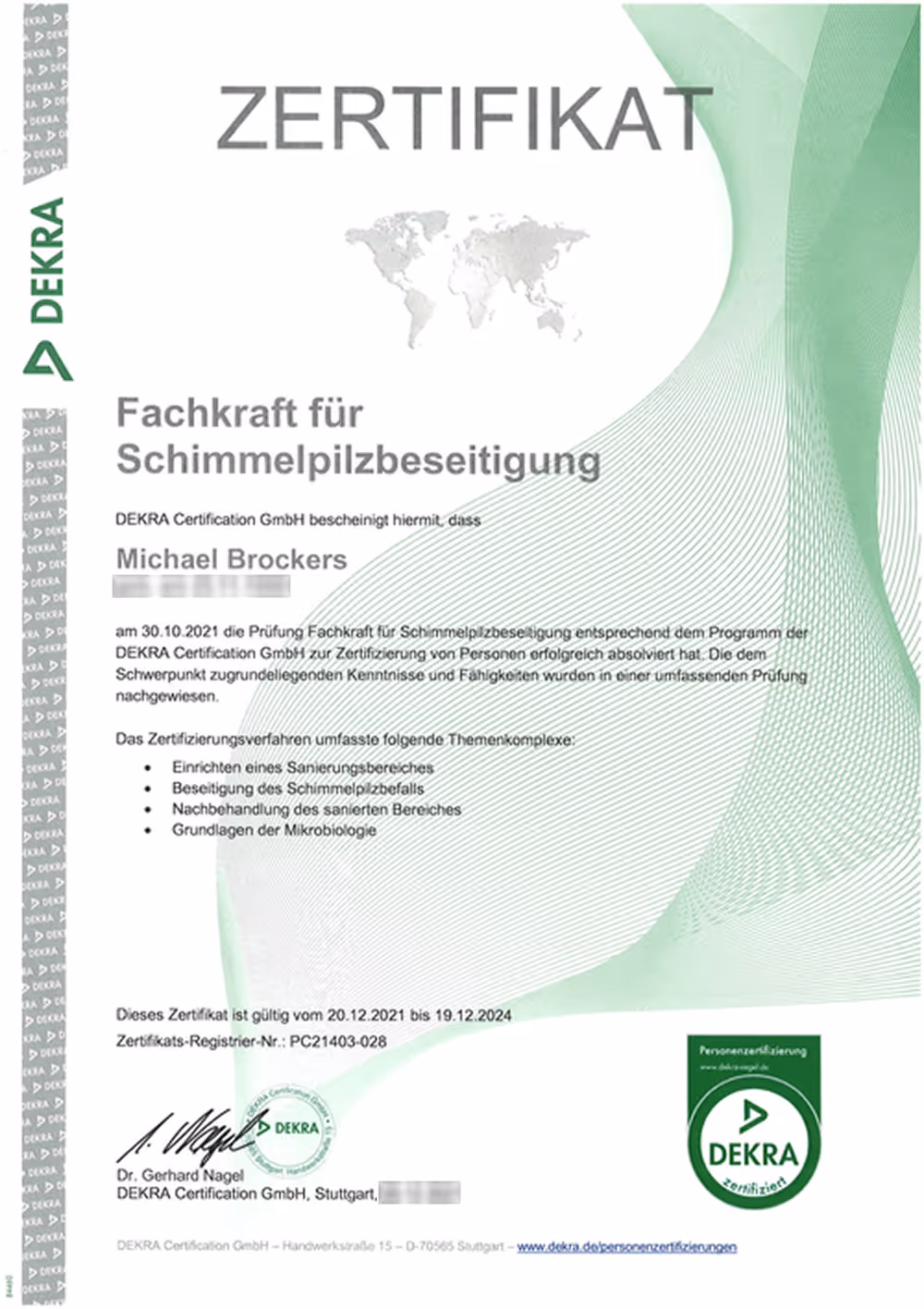 Zertifikat der DEKRA Certification GmbH für Michael Brockers als Fachkraft für Schimmelpilzbeseitigung mit Prüfungs- und Gültigkeitsdaten.