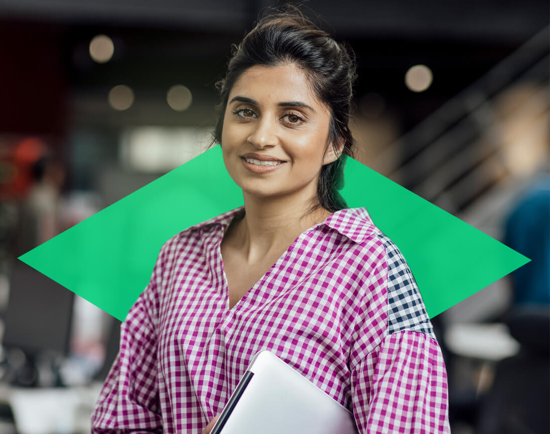 Woman holding a laptop, representing the finance team's confidence in ONSO's seamless, real-time Xero integration, ensuring accurate and audit-ready procurement and accounting records.