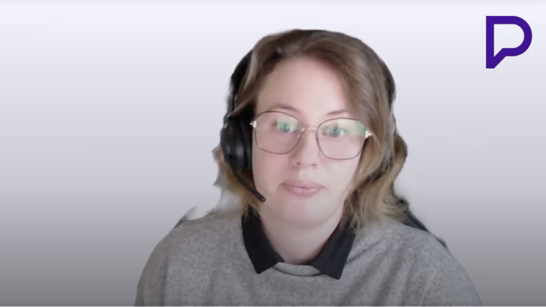 Provet representative with headset and glasses on neutral background