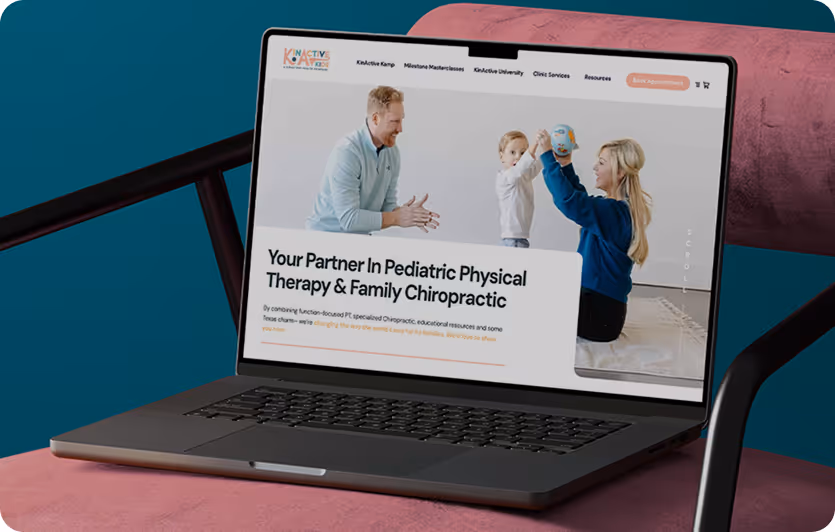 Laptop displaying a website for pediatric physical therapy and family chiropractic with an image of a man, woman, and child playing with a ball.