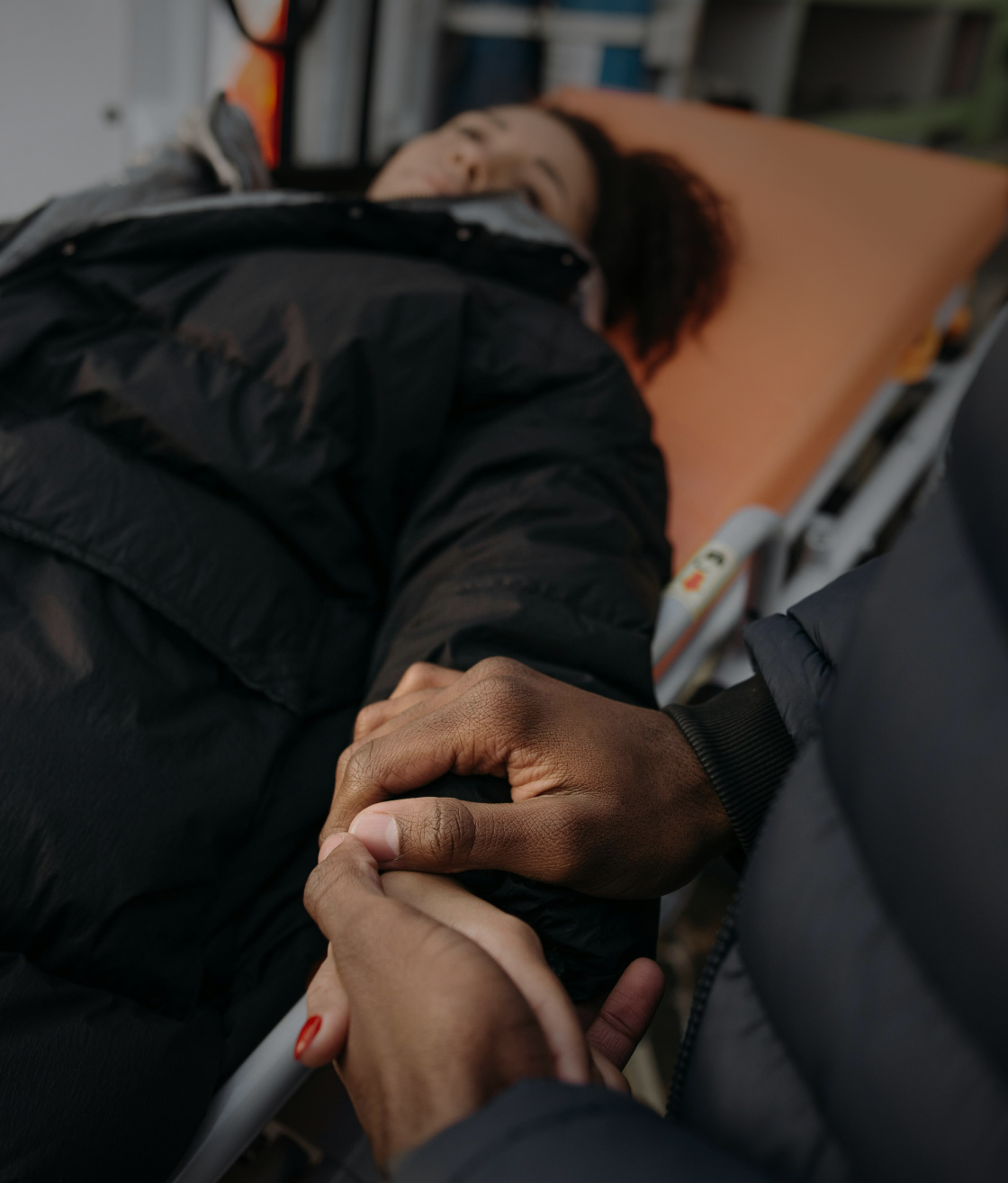 Red pedestrian stop signal at a traffic light.