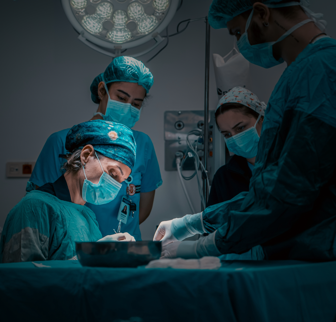 Woman holding her neck while looking at her phone near a car accident.