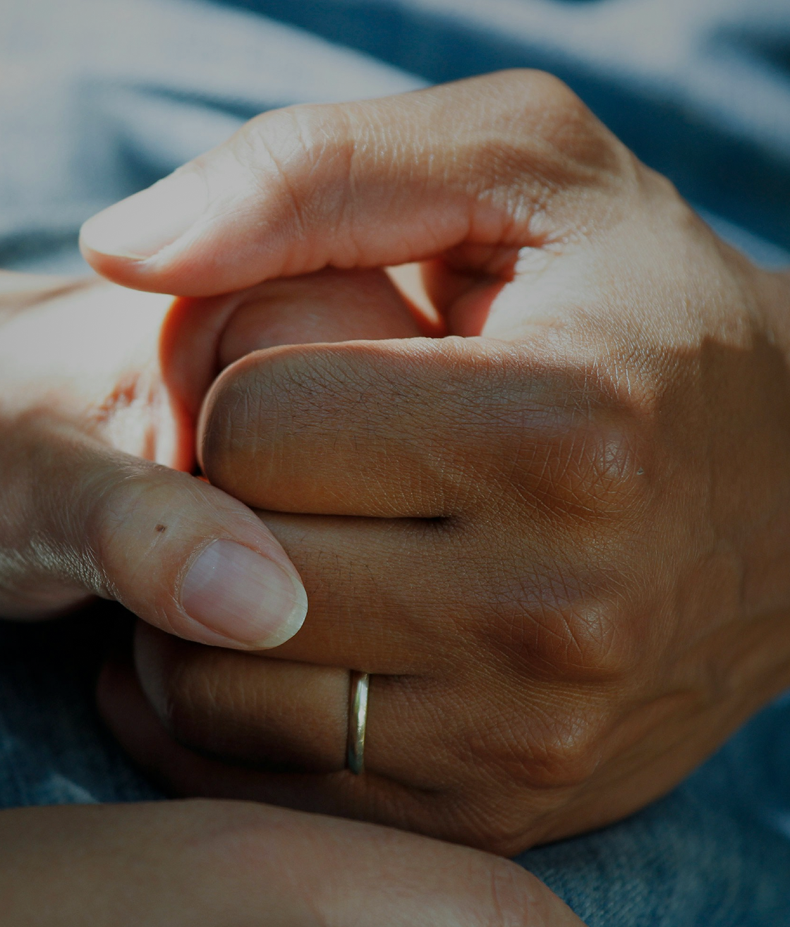 Red pedestrian stop signal at a traffic light.