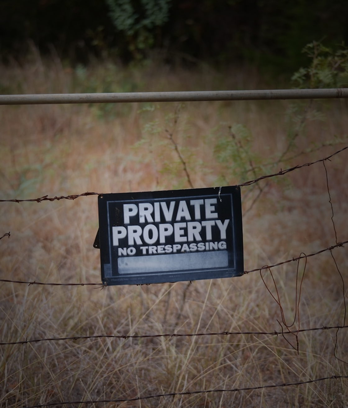 Red pedestrian stop signal at a traffic light.