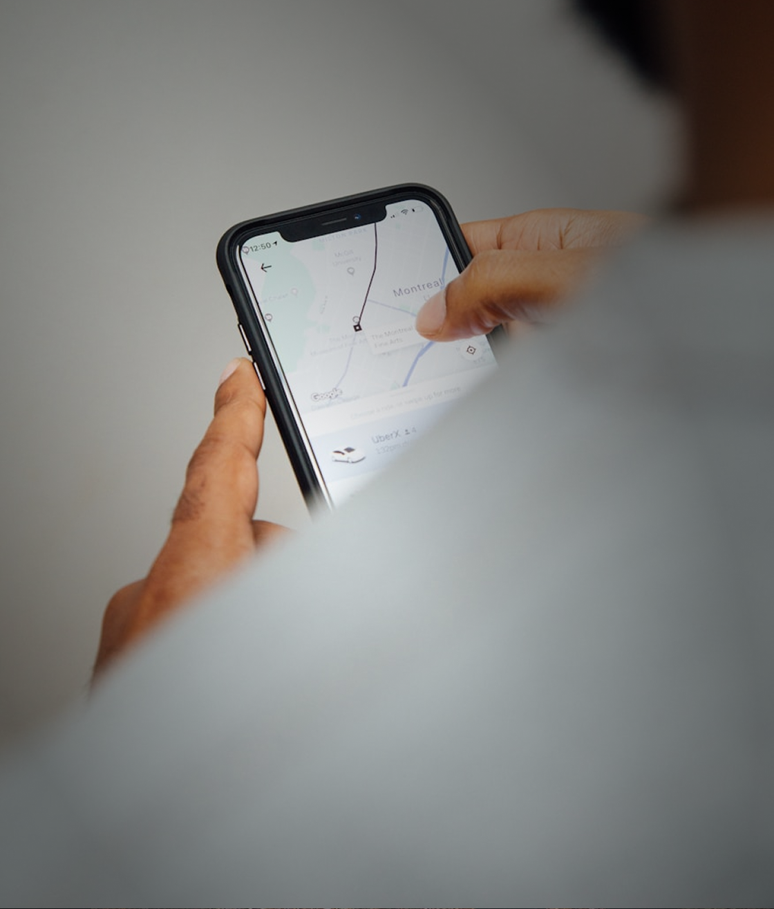 Red pedestrian stop signal at a traffic light.