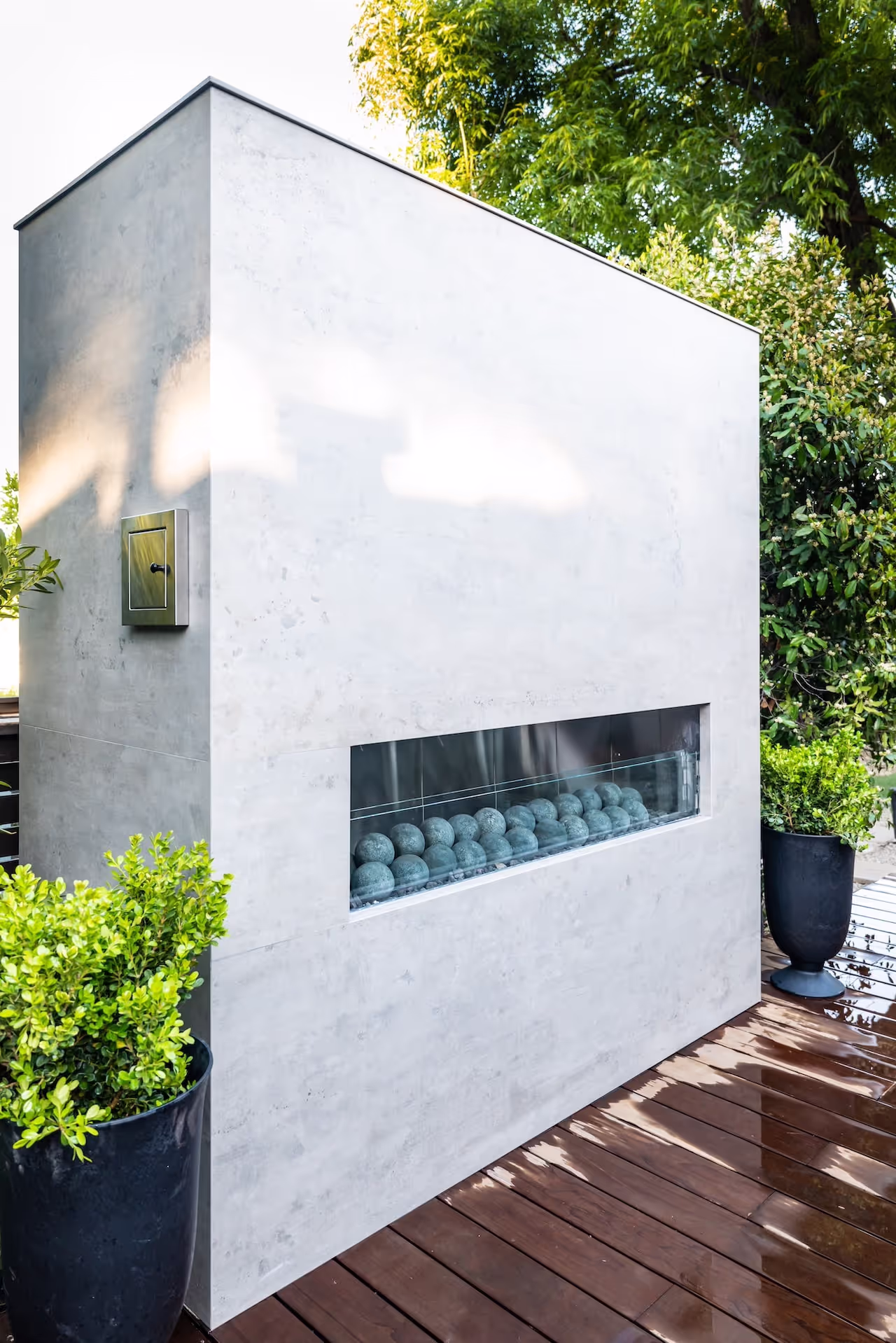 Modern exterior structure with minimalist architecture and custom finishes included in LeAnn Rimes’ Celebrity IOU transformation. Cabinetry by Marvel Cabinetry for HGTV’s Property Brothers: Celebrity IOU - LeAnn Rimes