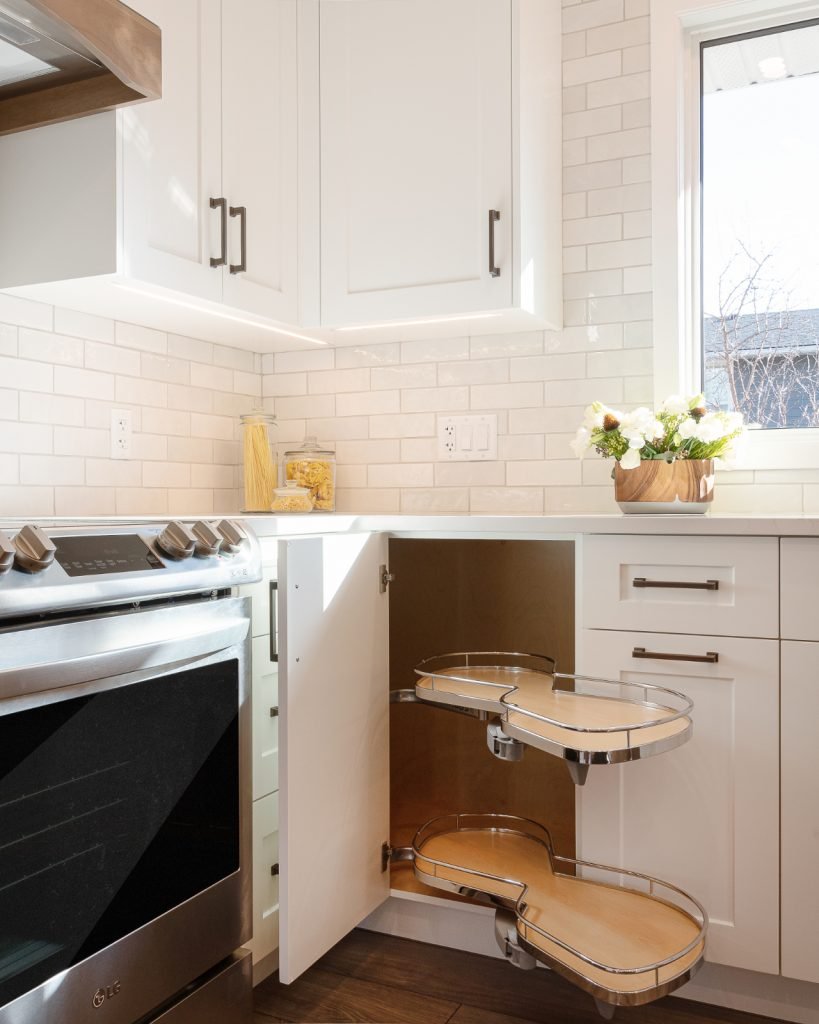 A lazy susan in corner cabinets by Marvel Cabinetry & Renovations