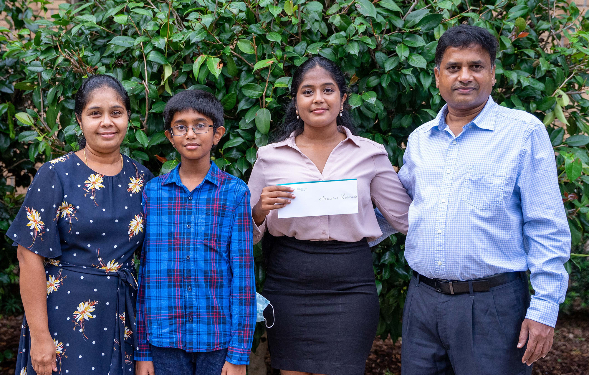 2021 Student scholarship winner poses with her family