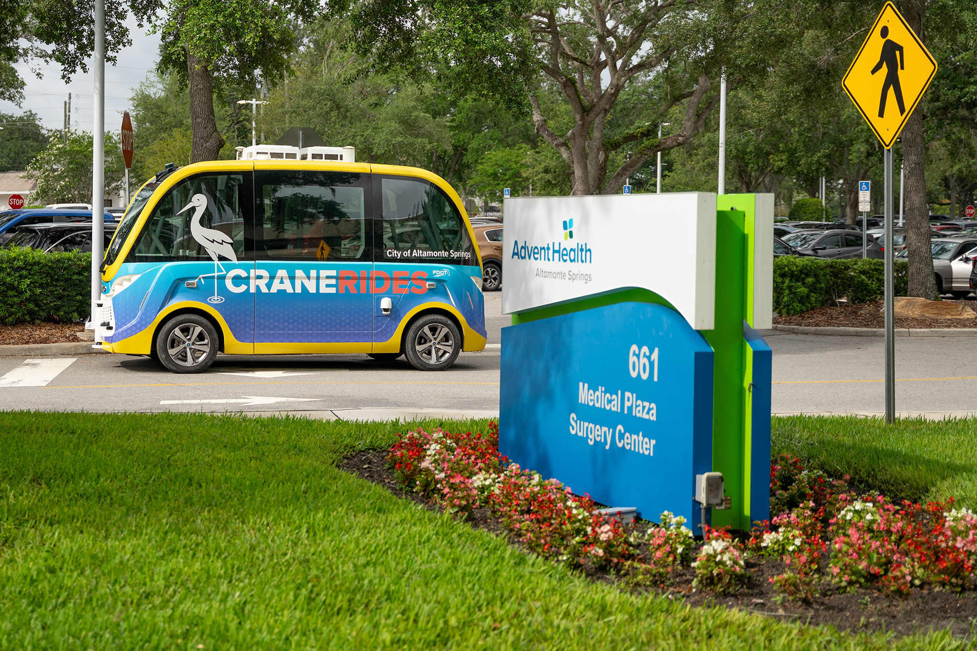 CraneRIDES shuttle traveling on the hospital campus