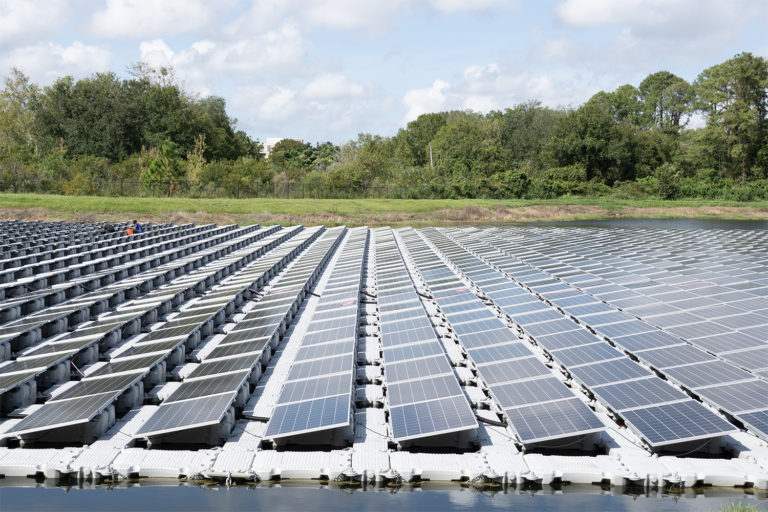 Close up view of solar panels floating on a pond