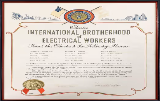 Historic International Brotherhood of Electrical Workers charter certificate for IBEW Local 42, featuring signatures, seals, and official union emblems.