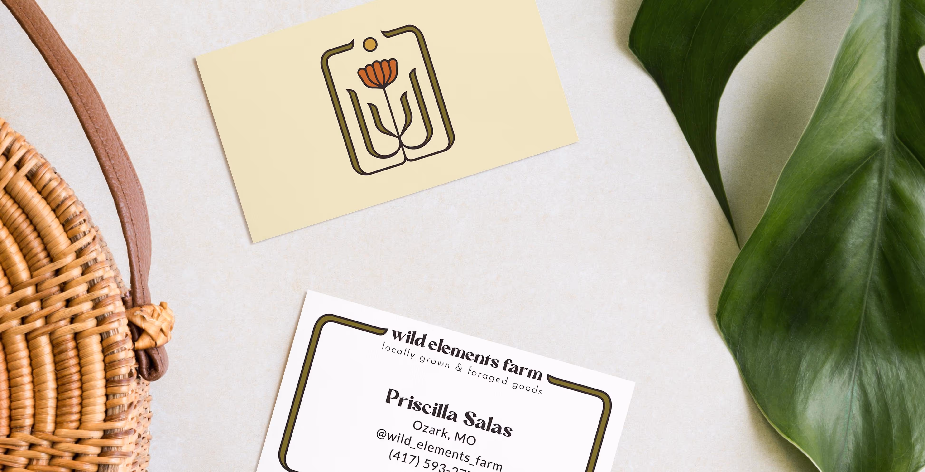 Mockup of Wild Element Farms business card. front and back