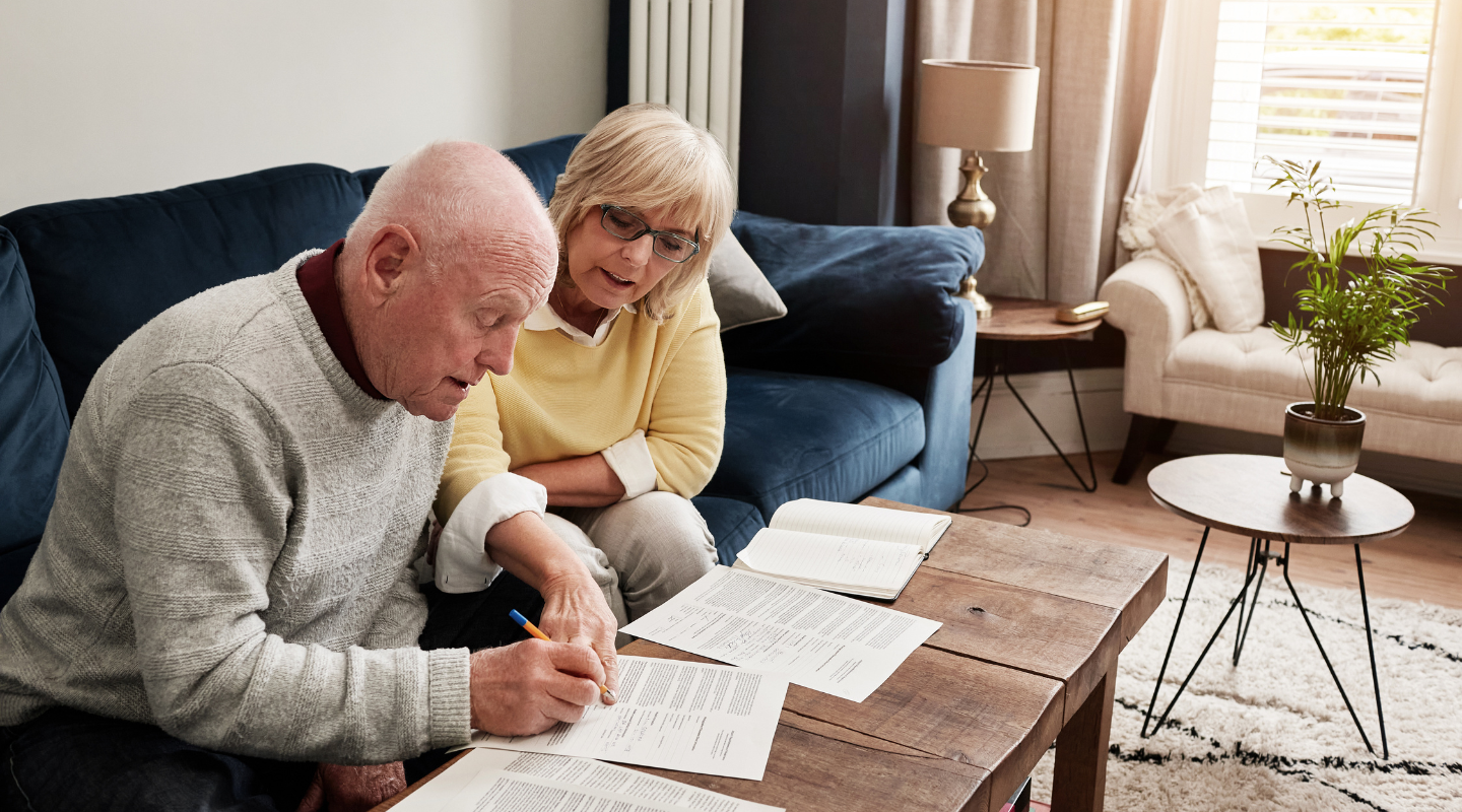 senior couple review their tax documents