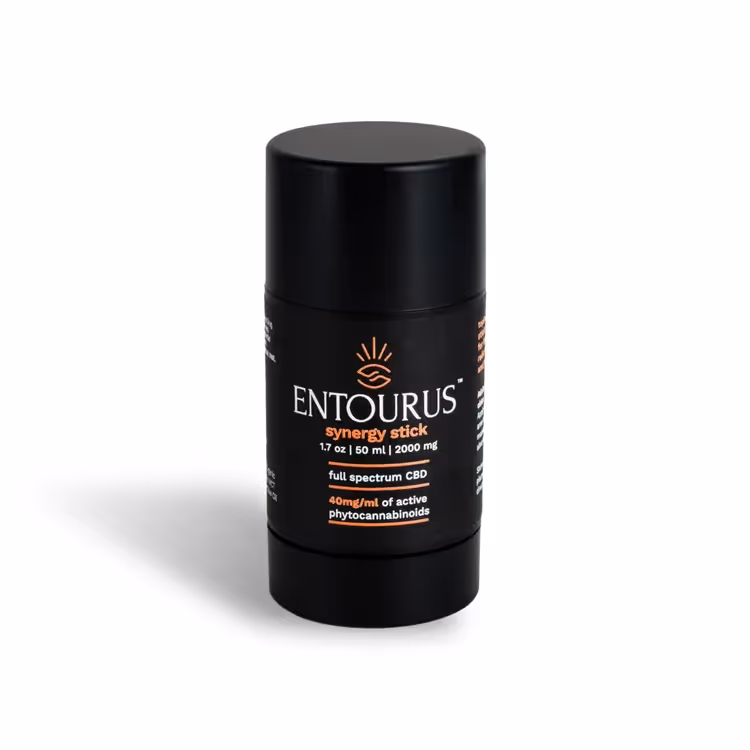 Entourus body stick standing on white background with soft shadow, product photography by Photos by Lars.