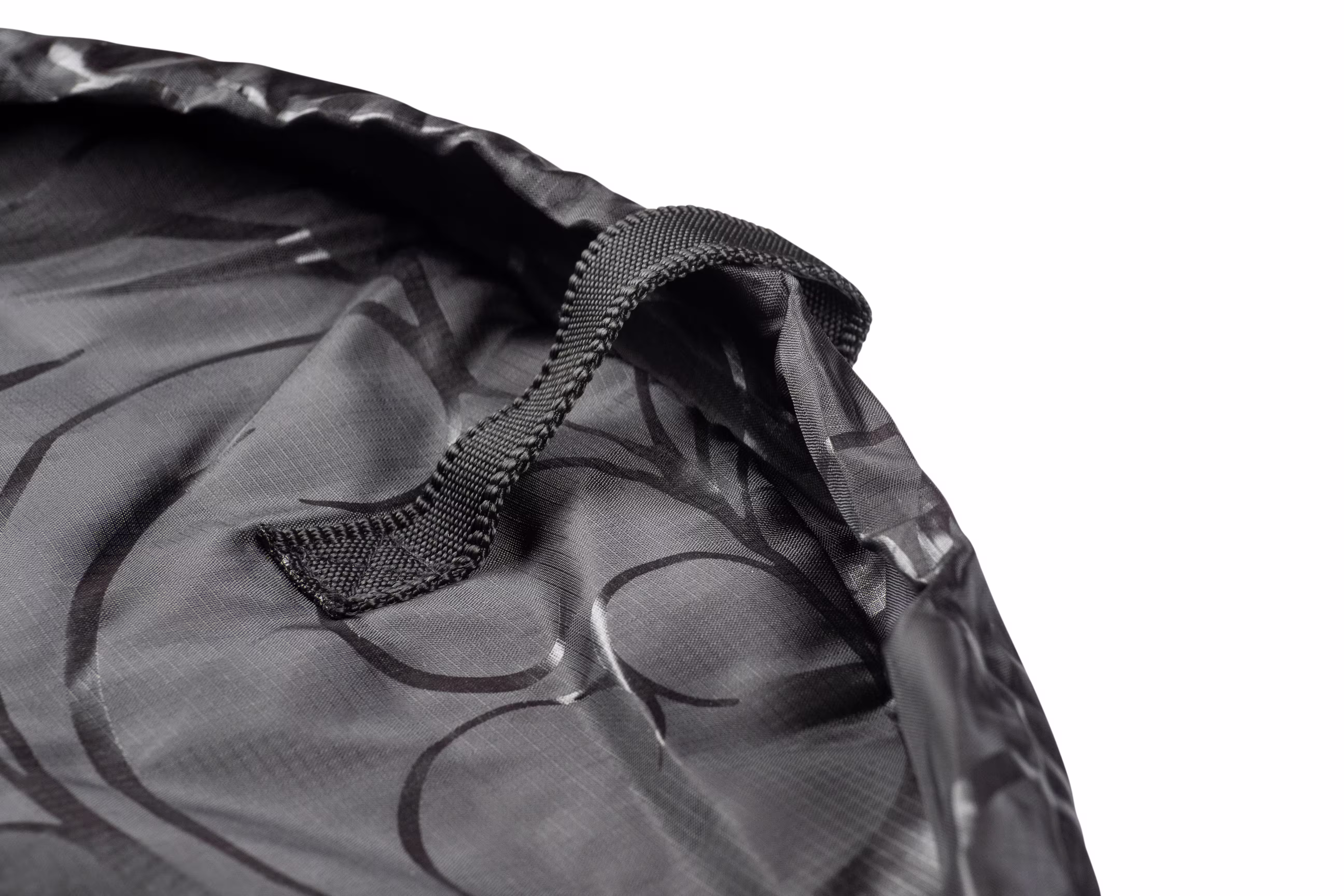 Close-up of Lay-n-Go bag fabric and seams on white background, product photography by Photos by Lars.