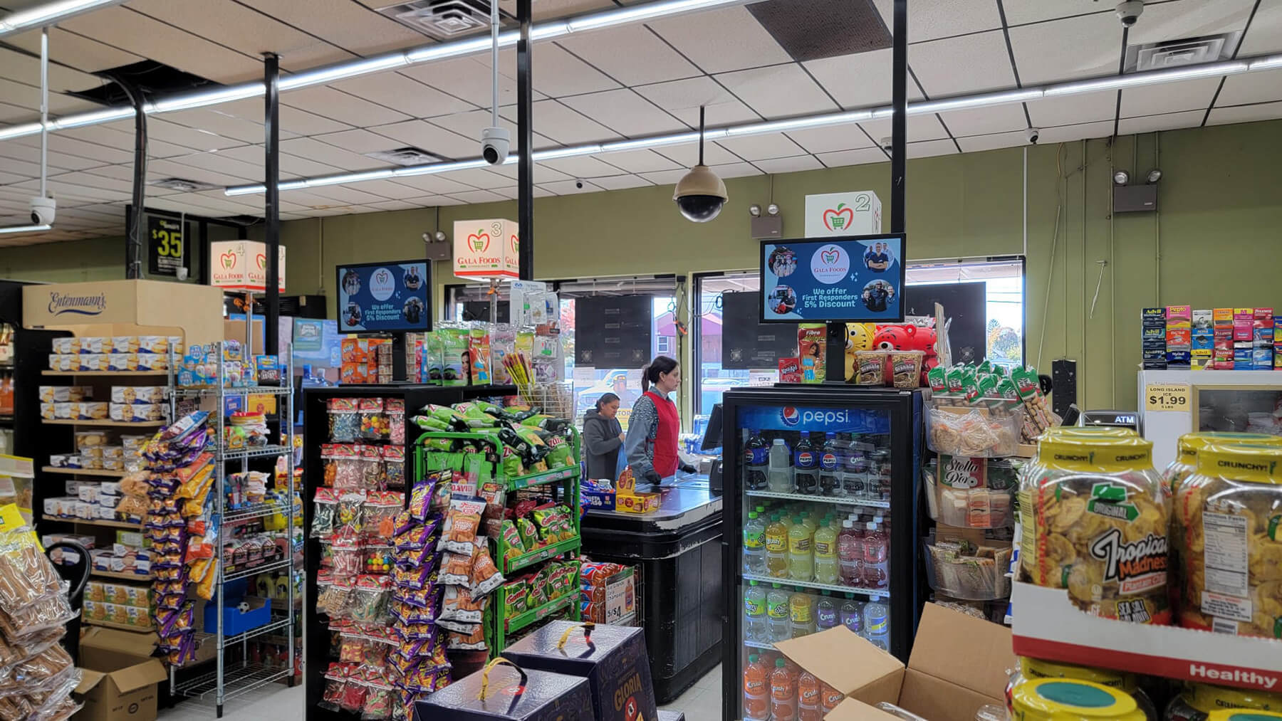 A grocery store with Gabi Media's screens featured prominently
