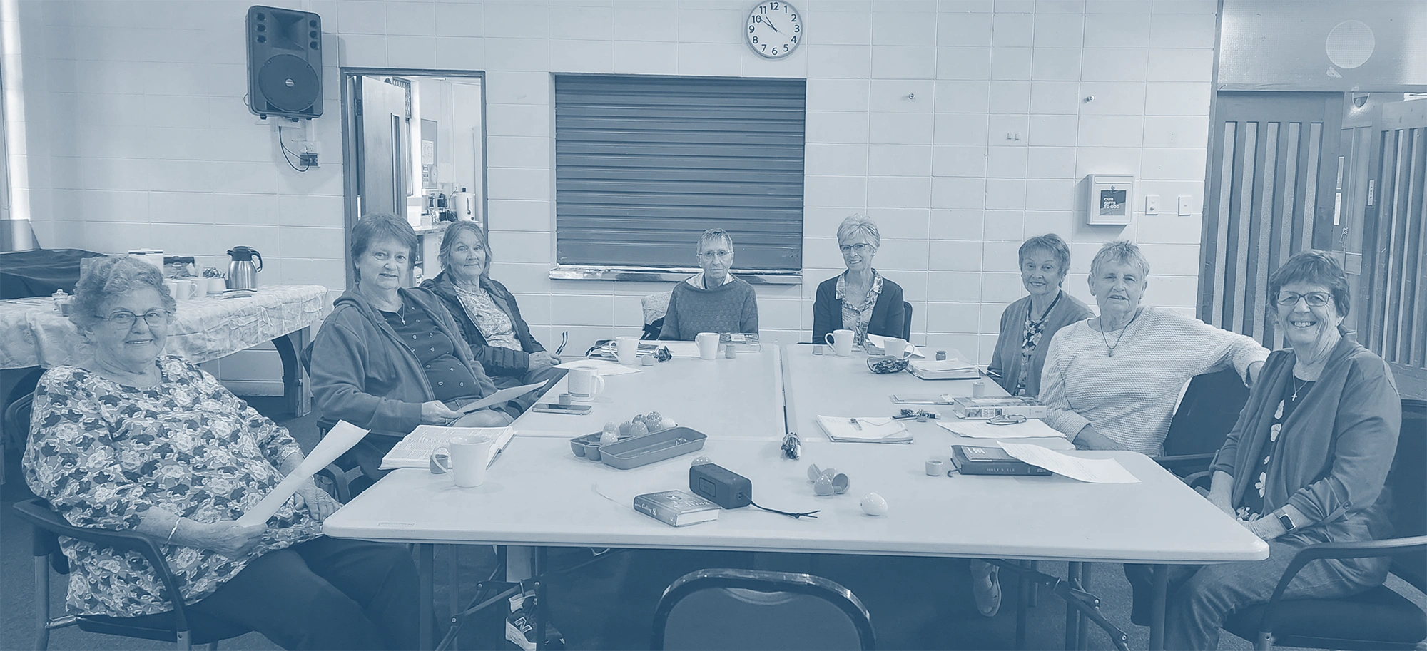 image of volunteers at a food drive event for a humanitarian aid nonprofit