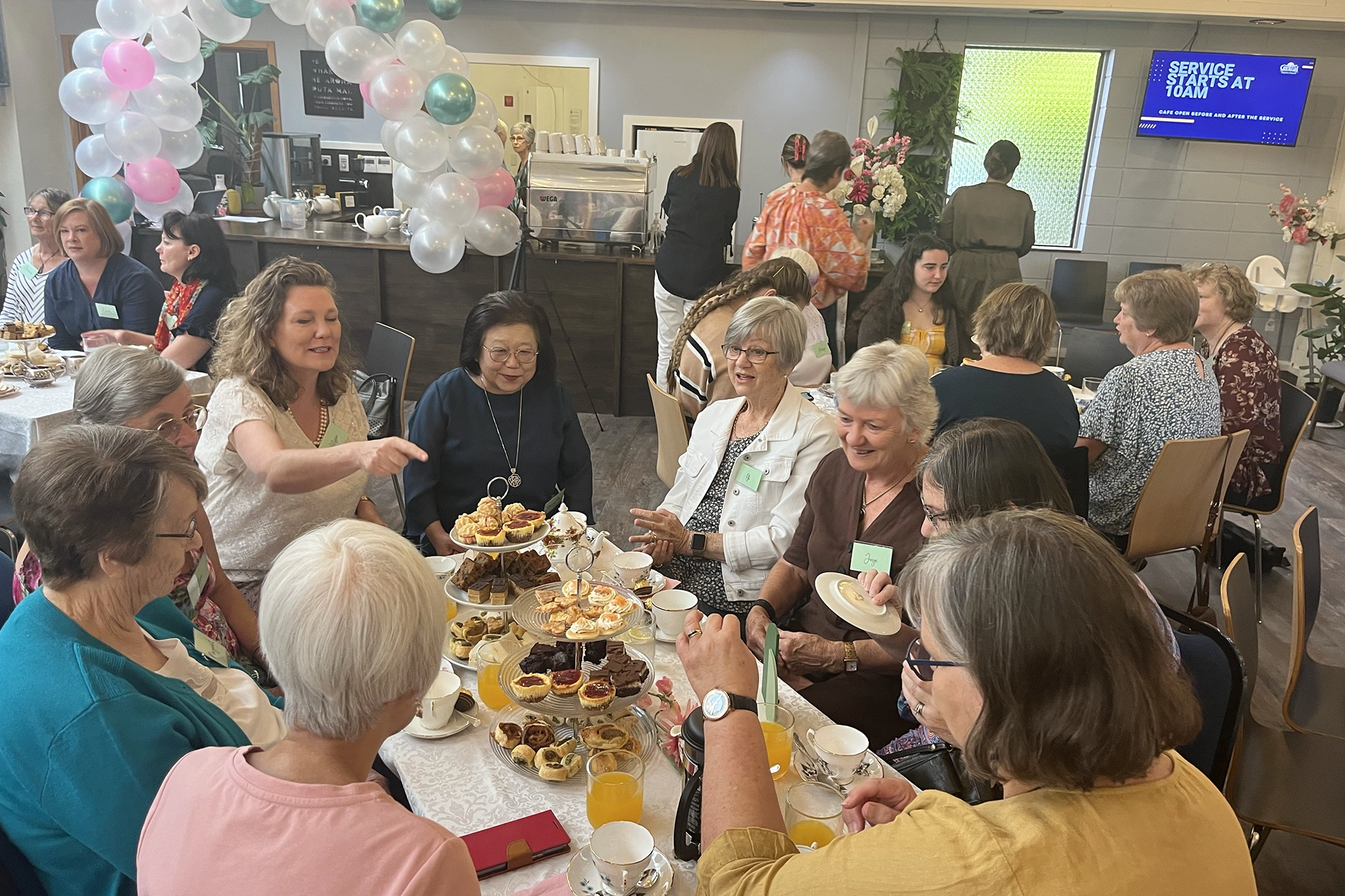 image of parents and staff discussing enrollment