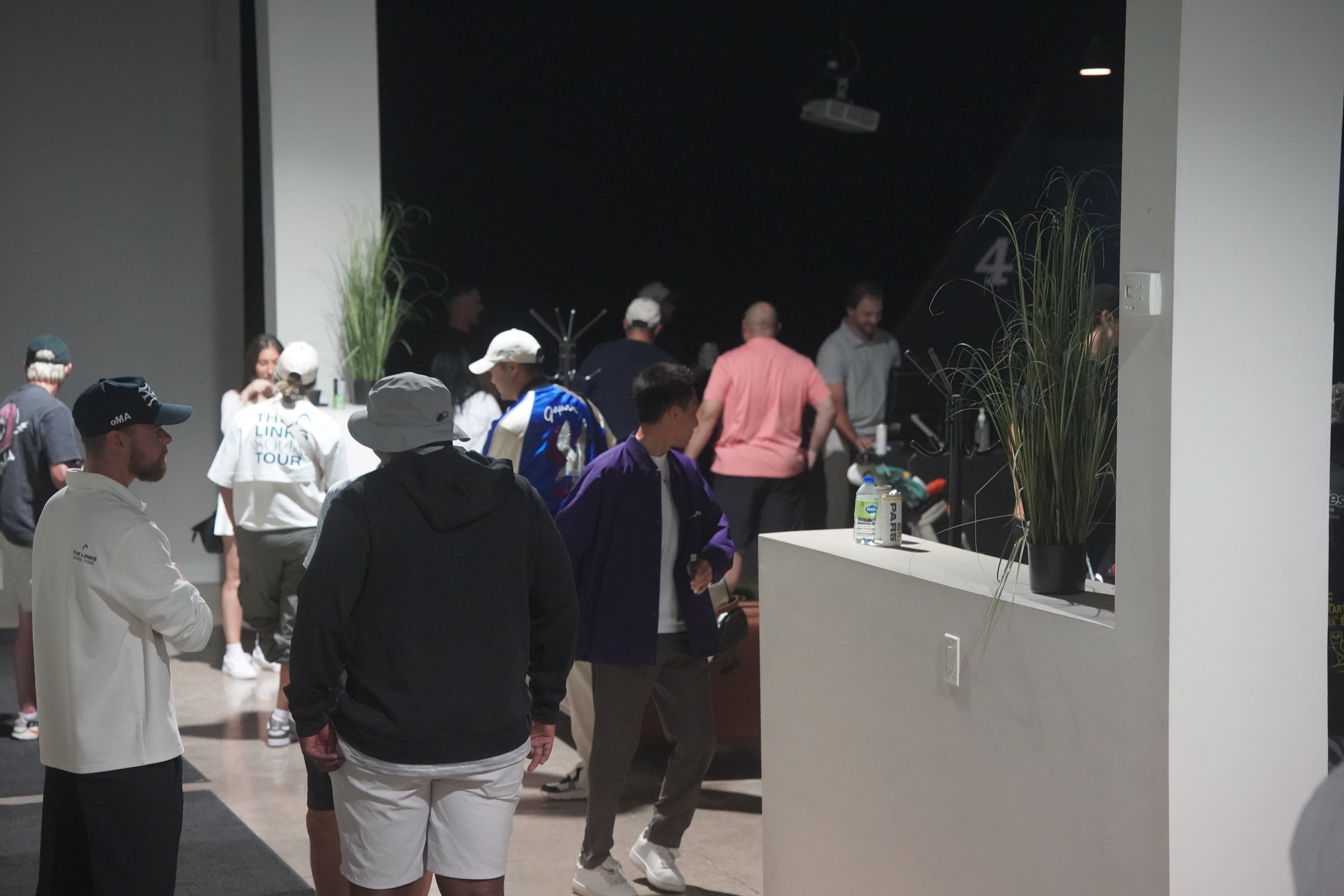 image of customers trying vr headset (for a tech retail business)