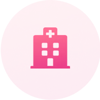 Pink circular icon with a subtle hospital building symbol in the center.