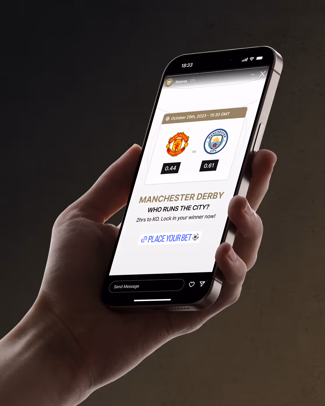 Hand holding smartphone showing a betting prompt for Manchester United vs Manchester City match with odds and match date.