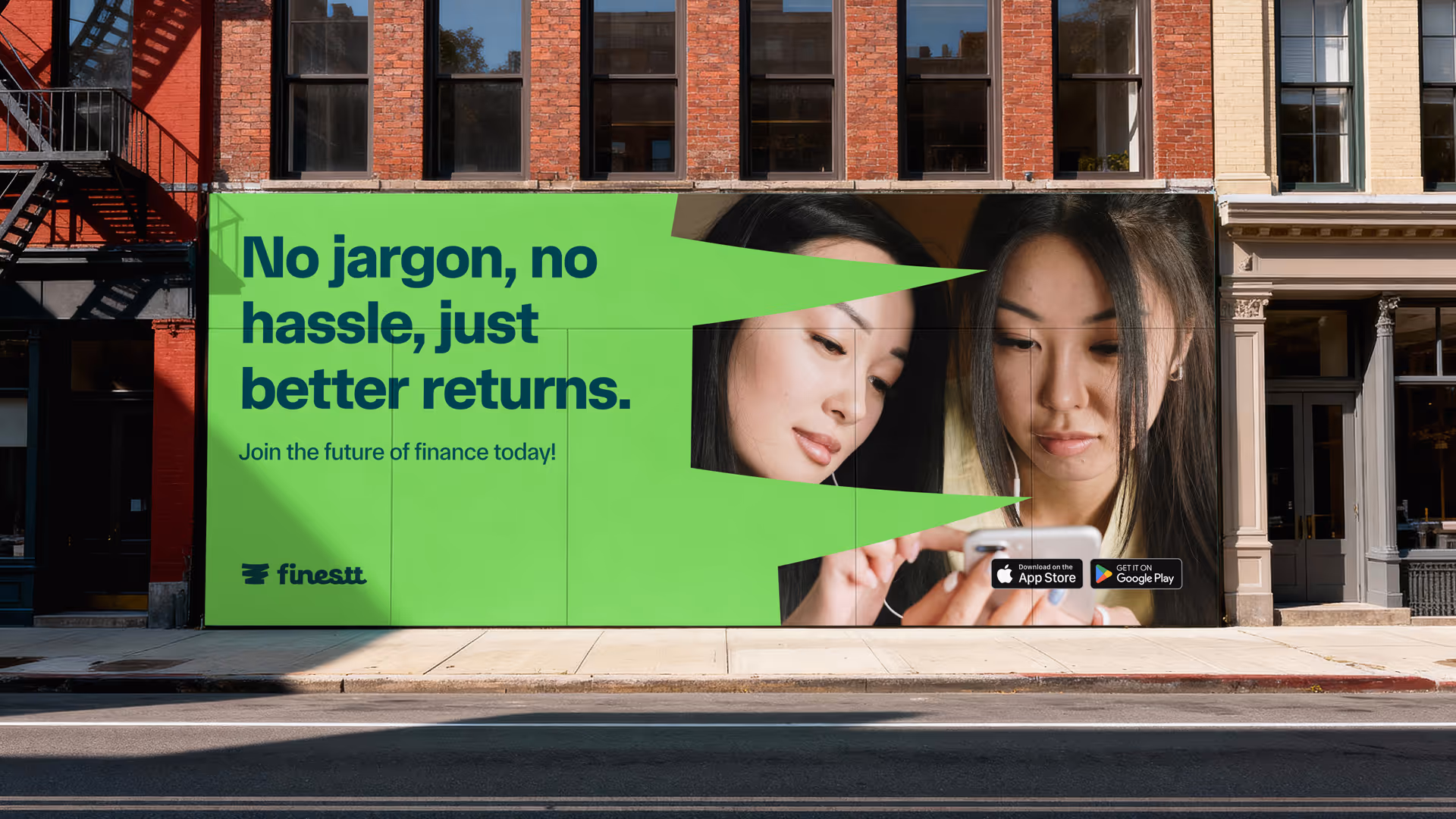 Outdoor billboard on a city street showing two women looking at a smartphone, with text reading 'No jargon, no hassle, just better returns. Join the future of finance today!' and app store download icons.