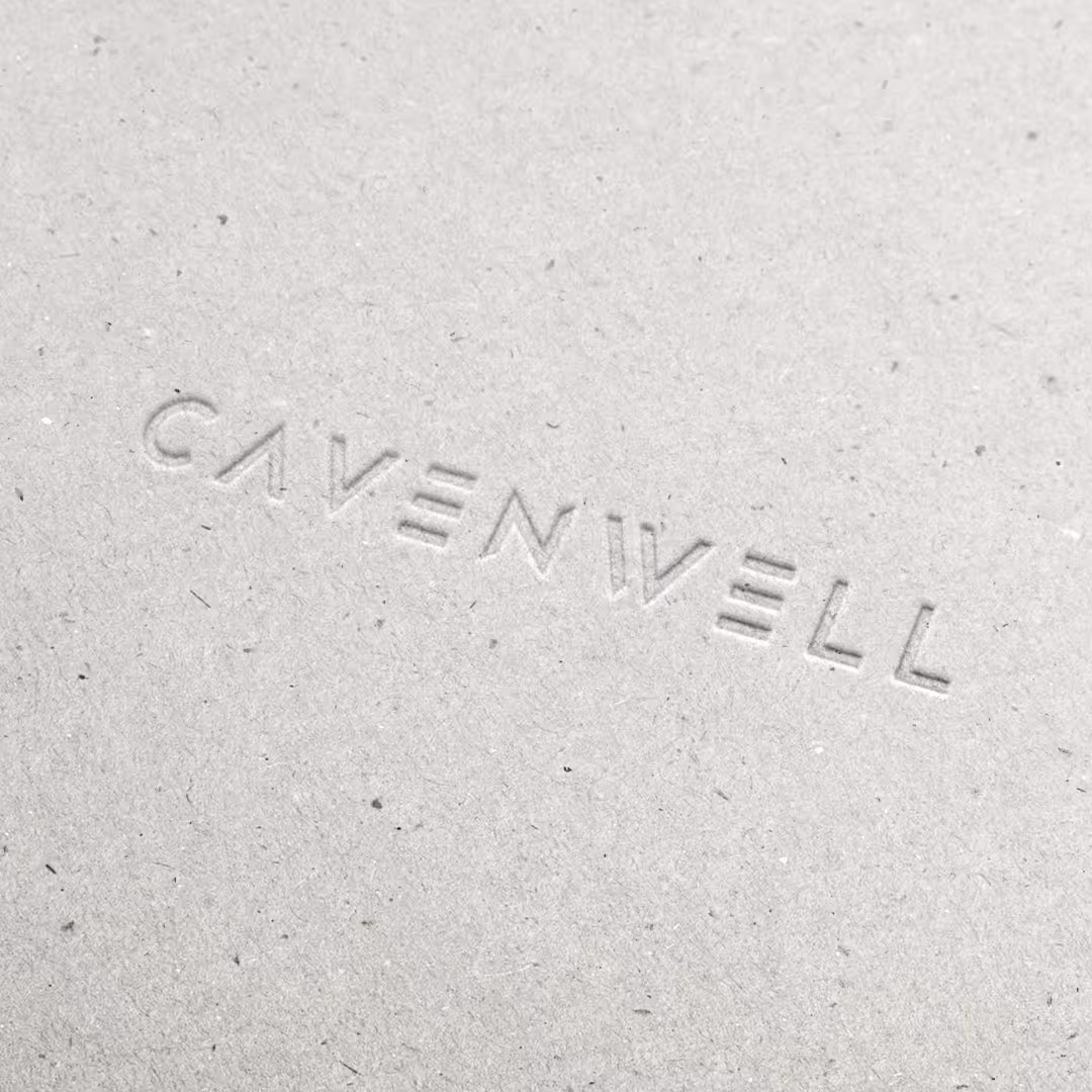Embossed text reading 'CAVENWELL' on textured beige paper.