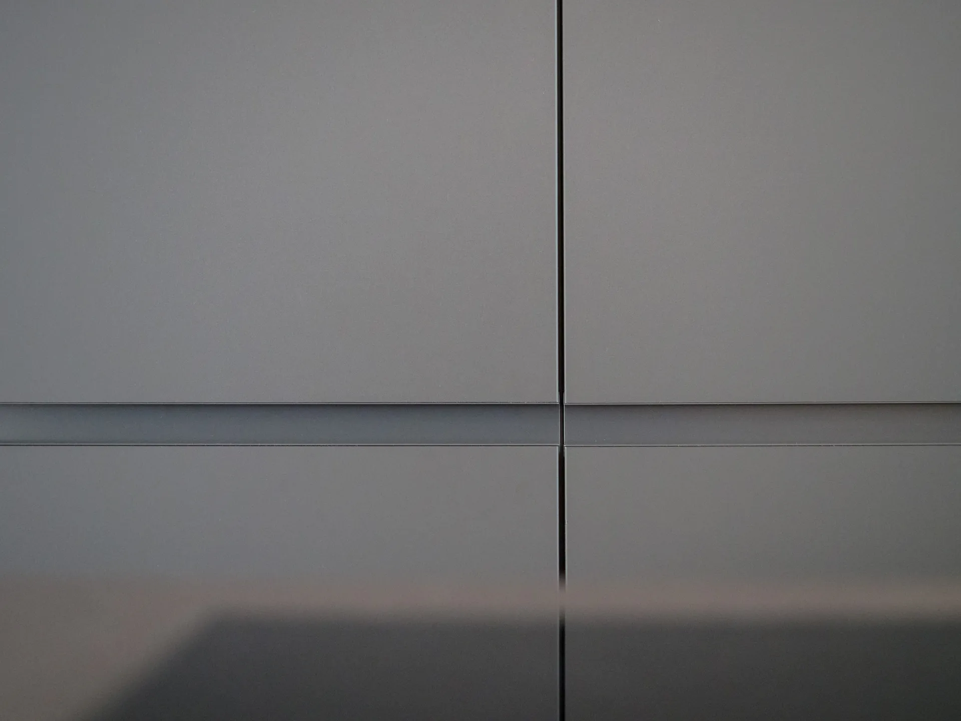 Designküche – Offene Wohnküche in Carbongrau mit Dekton