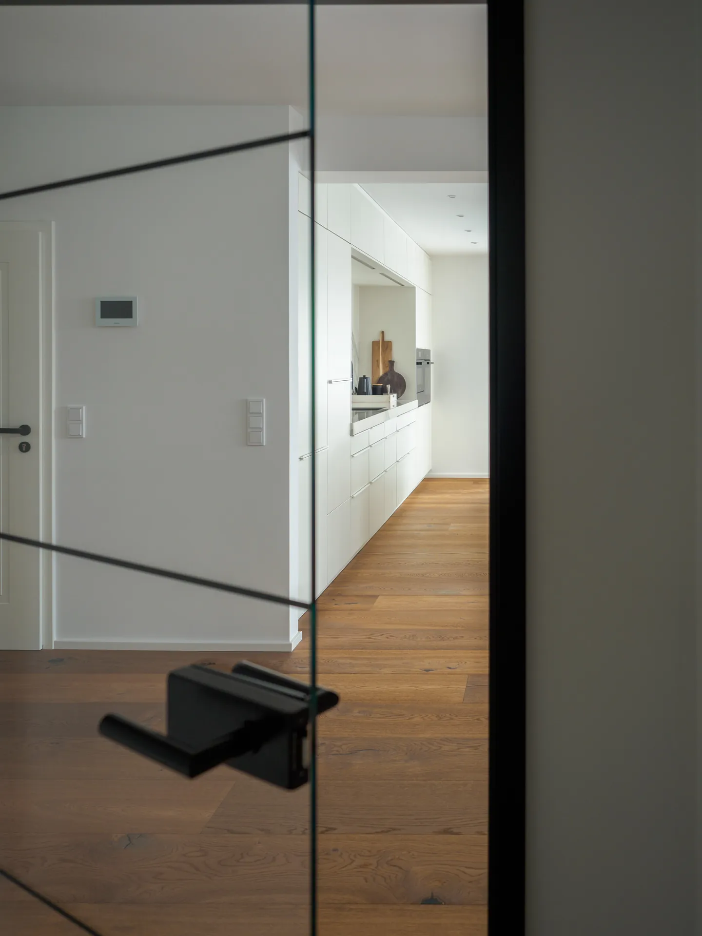 Designküche – Offene Wohnküche in Weiß Hochglanz