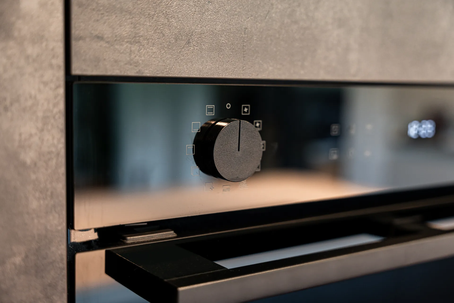 Grifflose Designküche mit Insel – Keramik mit Bora und Samsung