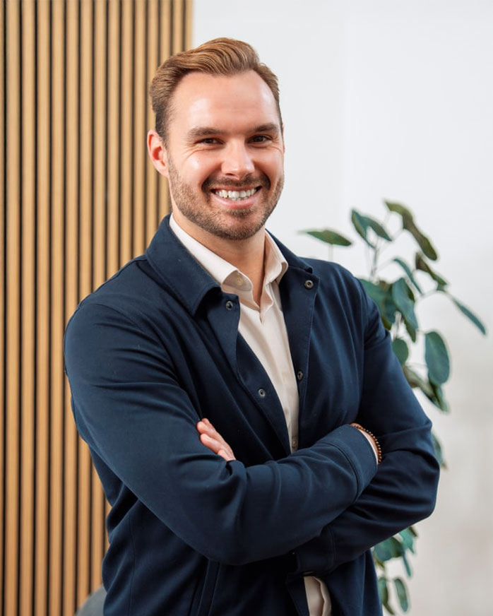 [headshot] image of satisfied customer shaking hands with company representative (for a fintech company)