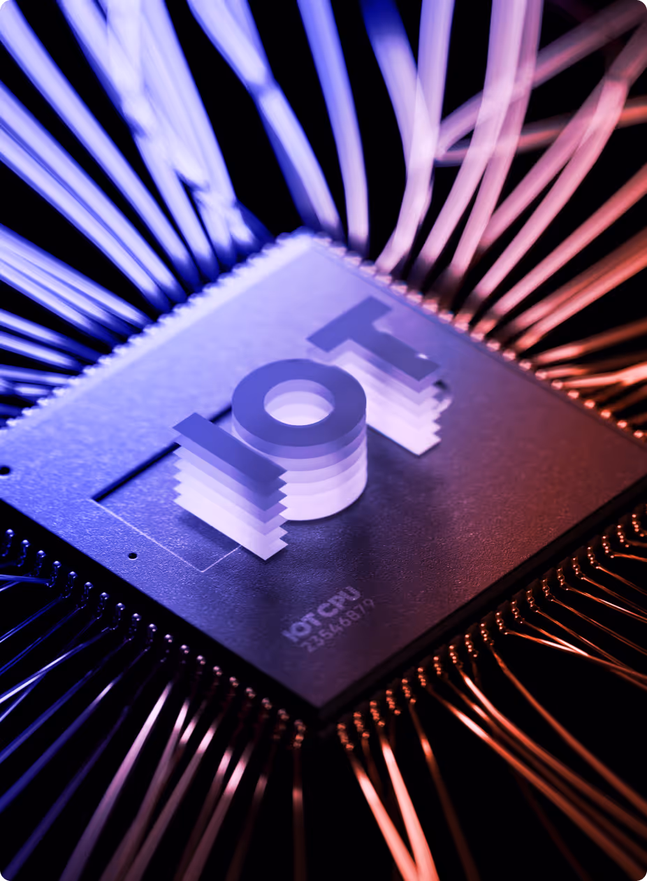 Close-up of a microchip with the 3D text 'IoT' rising from its surface, illuminated by purple and orange lighting.
