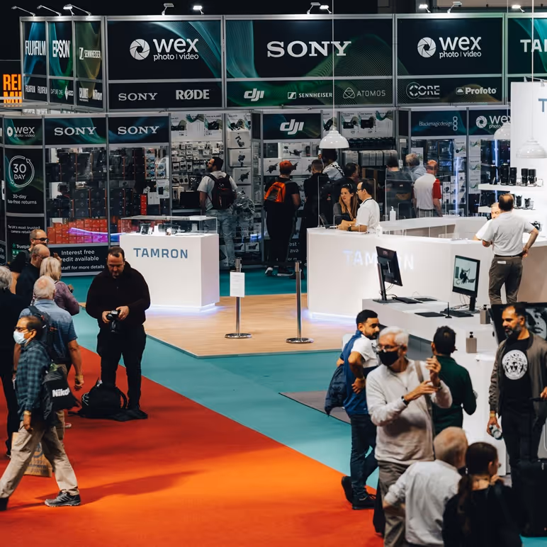 Conference attendees on a trade show floor