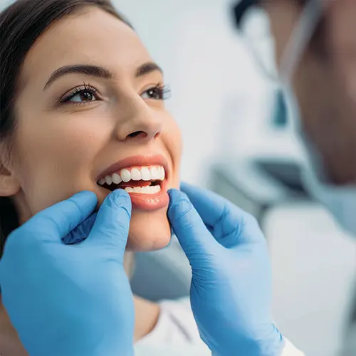 orthodontist doing an oral examination