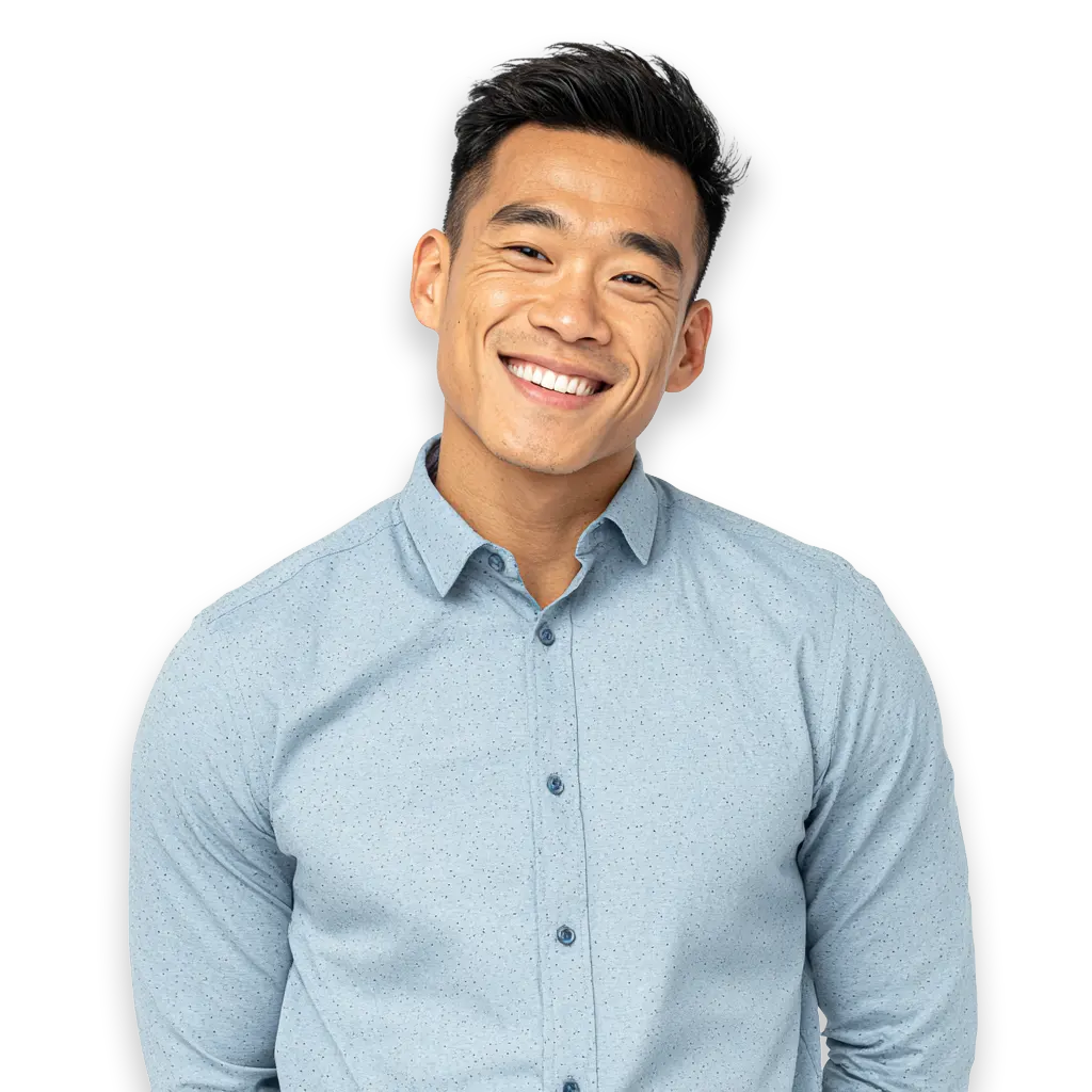 InSmile Braces patient smiling and pointing at lingual braces