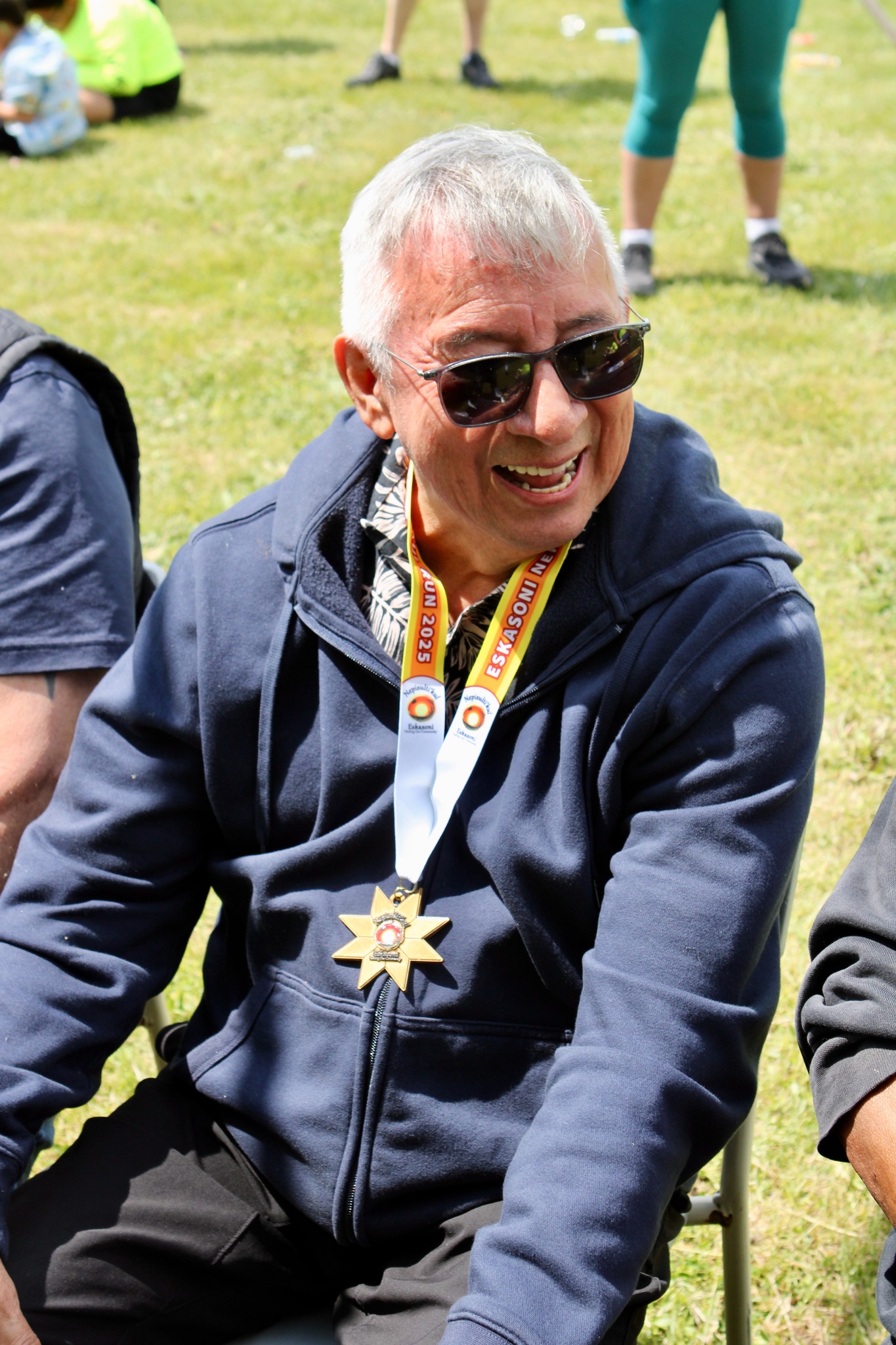 Photo of a participant at an outdoor event in Eskasoni First Nation.