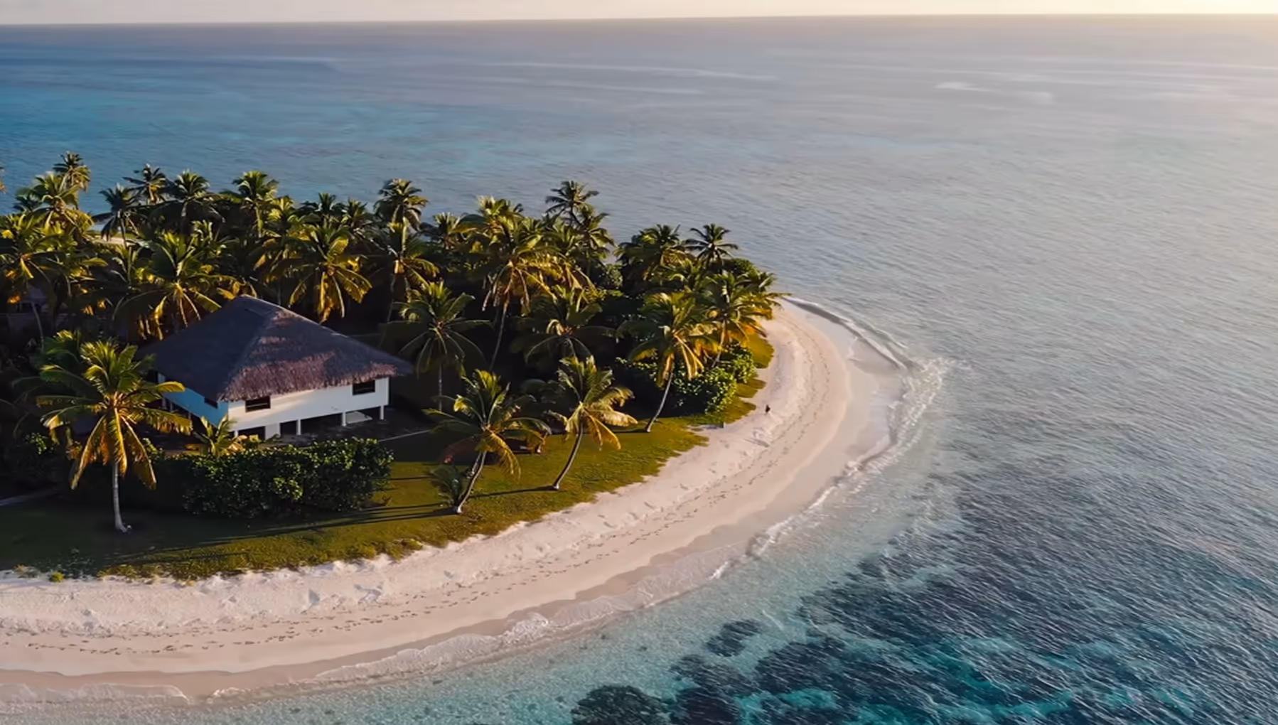 BON Sojourn tropical island resort with palm trees and white sandy beach