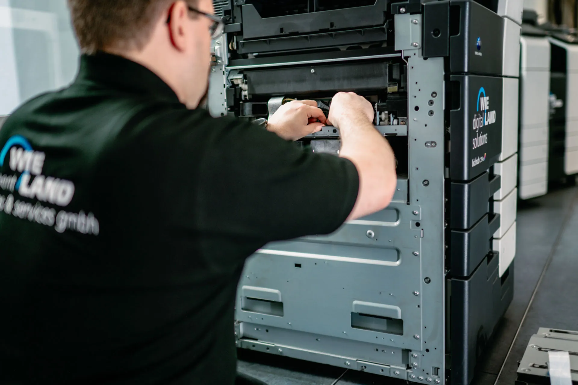 Reparaturservice und Wartung durch Wieland Digital Solutions an einem Drucker