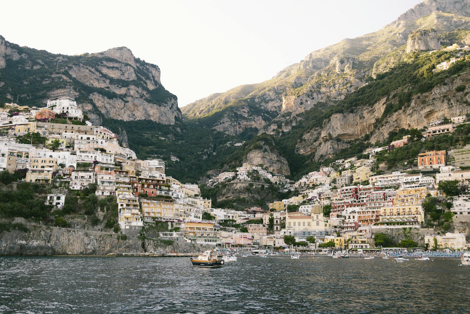 Positano bay with multicolored houses stacked on the hillside overlooking the sea