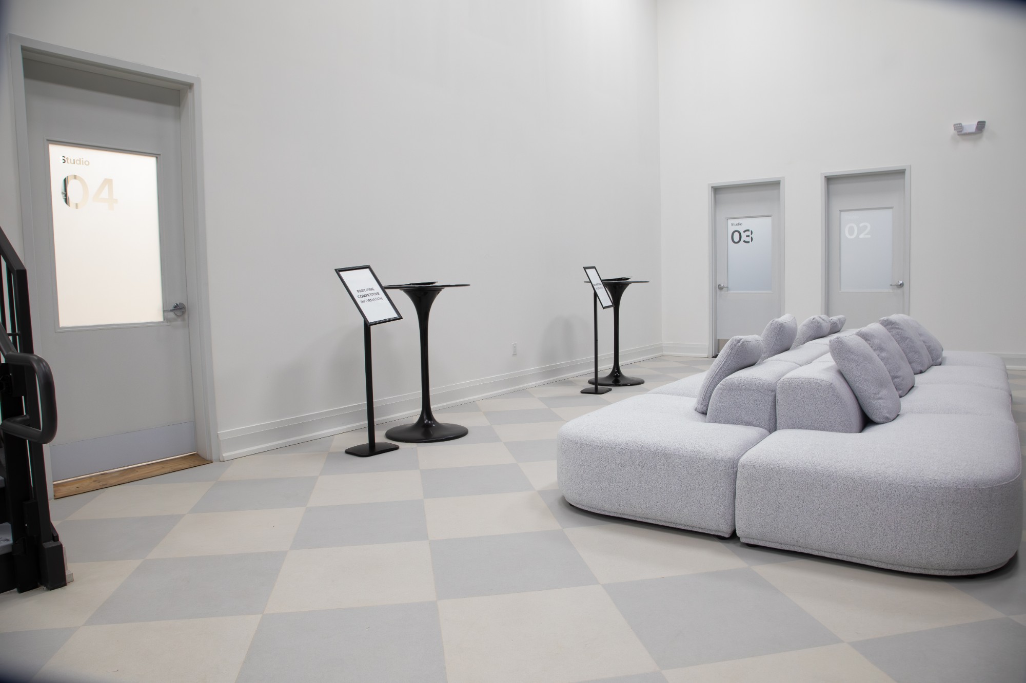 Studio hallway and lounge seating outside Studios 2, 3 and 4 at The NINE