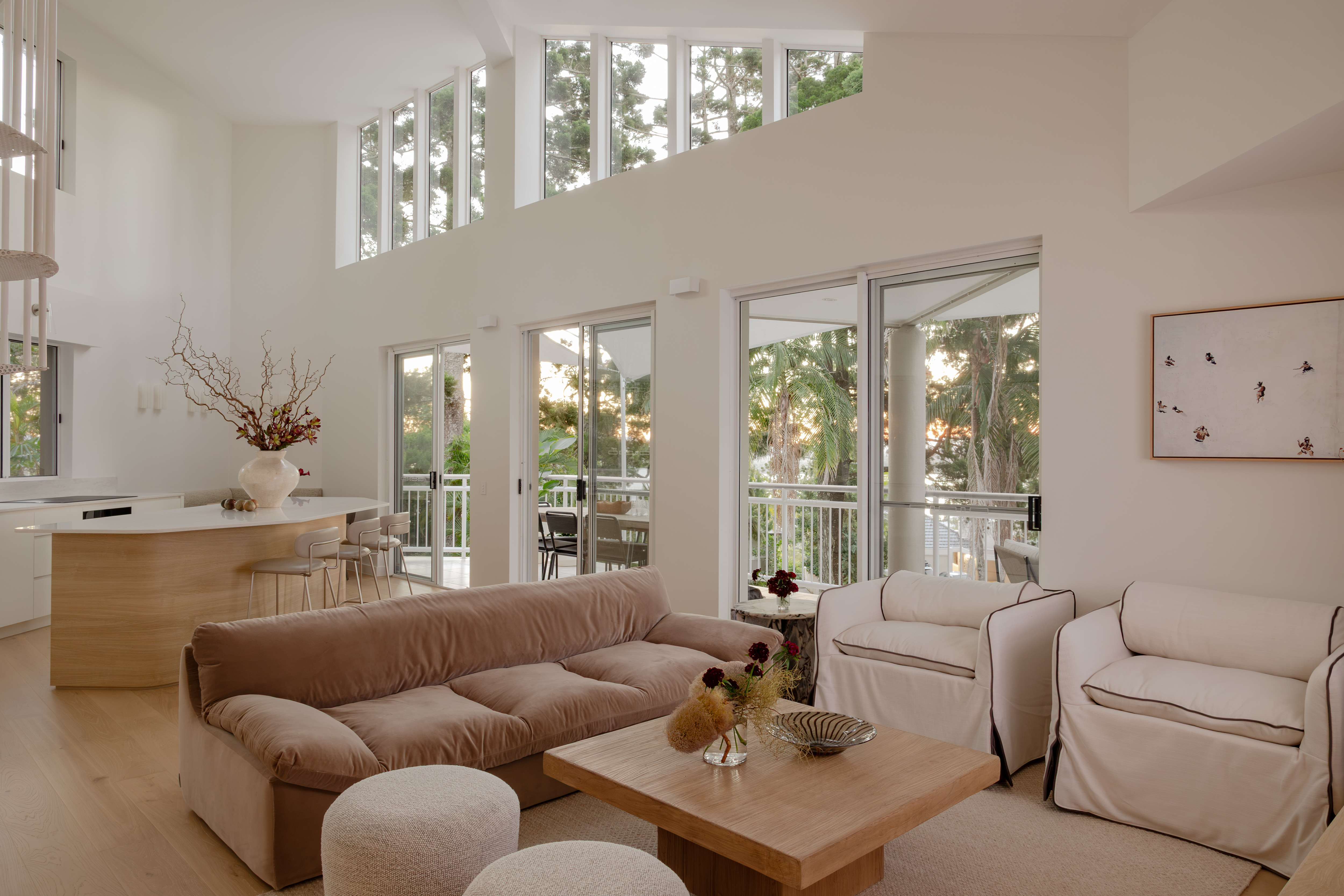 Coastal living room with soft neutral furnishings, Edgar Bennett renovation in Noosa Heads by Pearl Interiors
