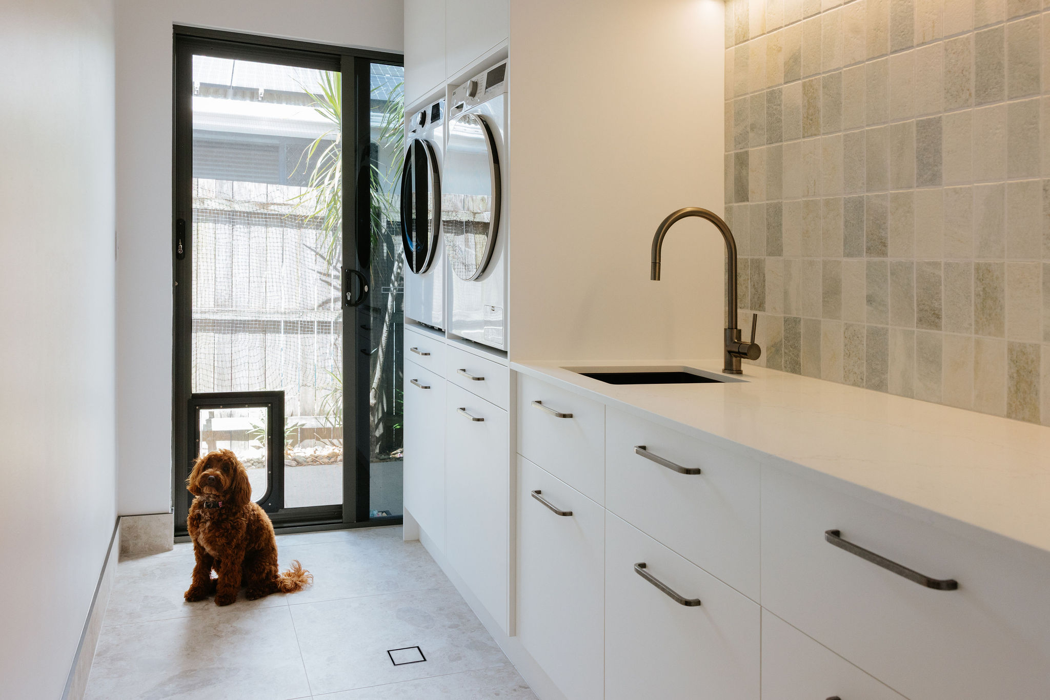 Renovated Peregian Springs bathroom with stone benchtop and full-height tiling, interior design by Pearl Interiors on the Sunshine Coast
