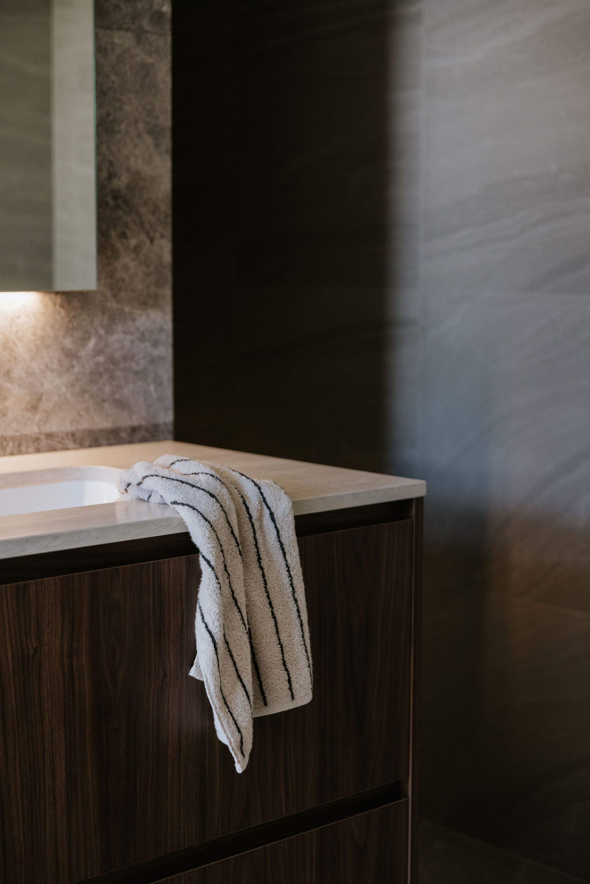 Tiled floor and shower detail in a Peregian Springs bathroom designed by Pearl Interiors
