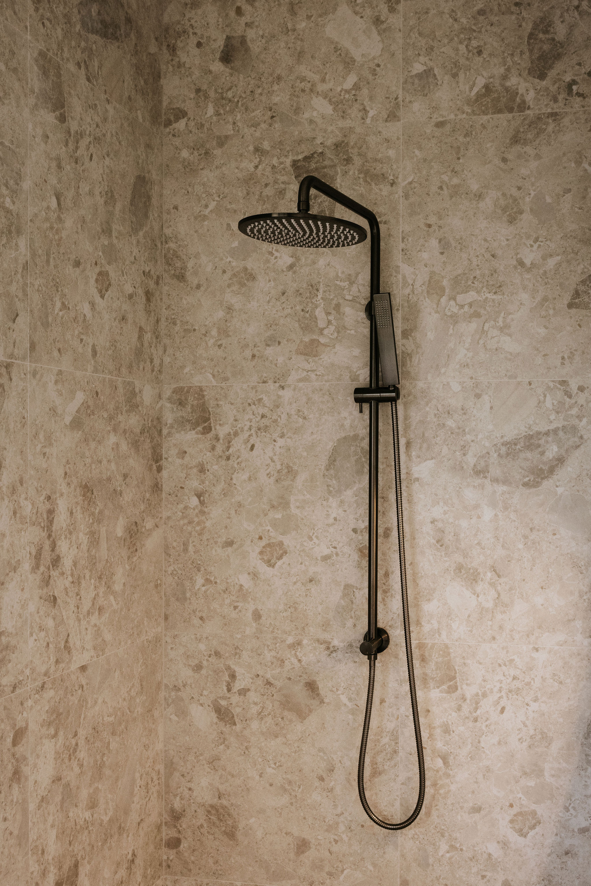 Vanity mirror and lighting in a renovated Peregian Springs bathroom designed by Pearl Interiors