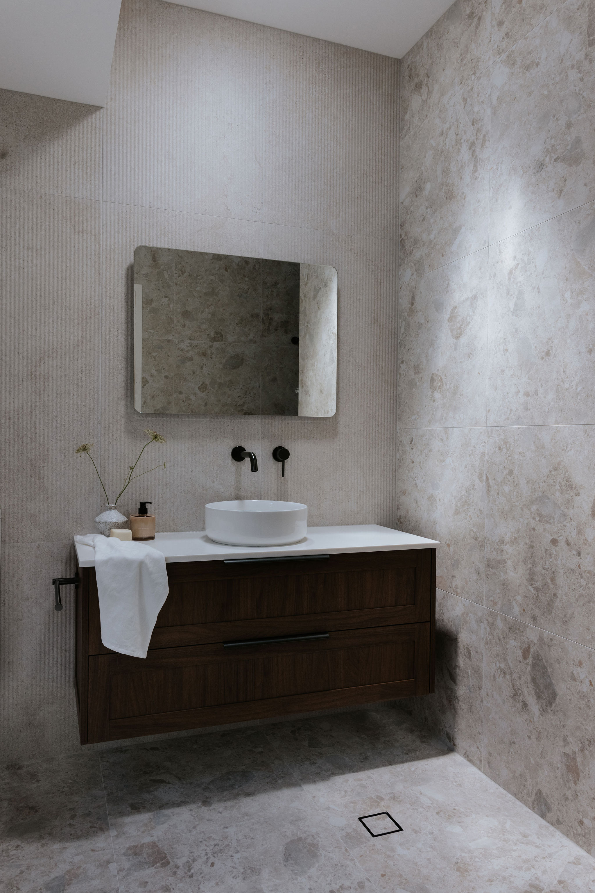 Finished Peregian Springs bathroom with stone and tile finishes by Pearl Interiors, Sunshine Coast